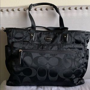 Coach signature multipurpose diaper bag.